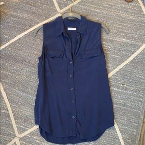 Equipment sleeveless button down